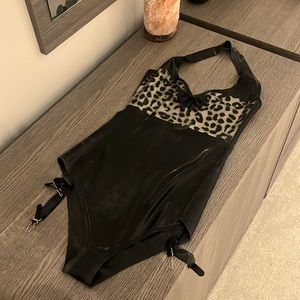 Brand new, never worn Deadly Couture latex bodysuit. Size Small.